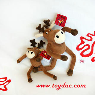 Renne de Noël en peluche avec écharpe