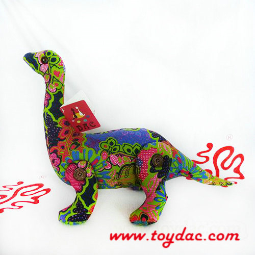 Dinosaure au design original en peluche Dac