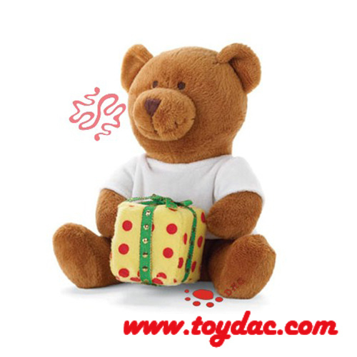 Cadeau d'ours de vacances en peluche