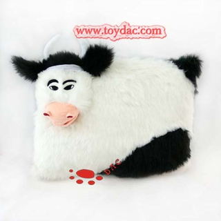Coussin de vache en peluche de qualité supérieure.