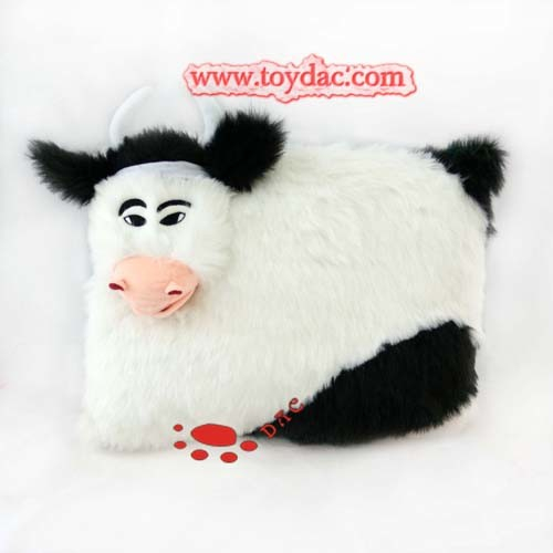 Coussin de vache en peluche de qualité supérieure.