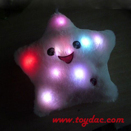 Coussin en peluche à sept lumières LED colorées