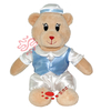 Ours en costume national en peluche